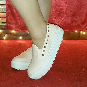 Pink faux snake skin shoes